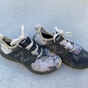 Womens new balance floral tennis shoe.